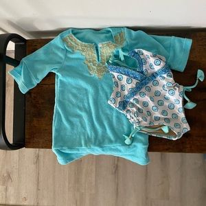 one piece swim suit but with an over cover